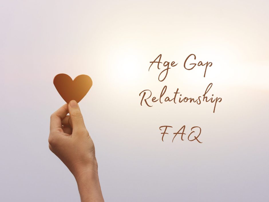A hand holding up a paper heart, for a post on being in a big age gap relationship