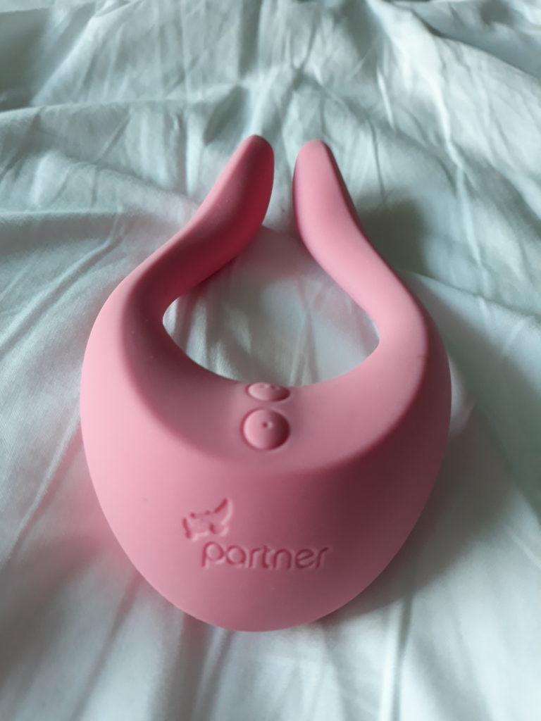The Satisfyer Multifun, a pink u-shaped vibrator