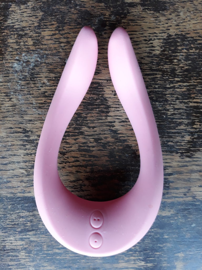 The Satisfyer Multifun, a pink u-shaped vibrator