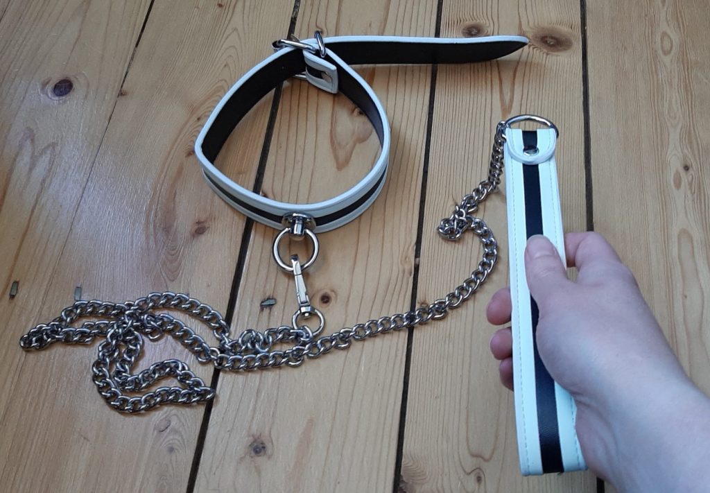 Kinky collar and lead set BDSM toy in vegan leather