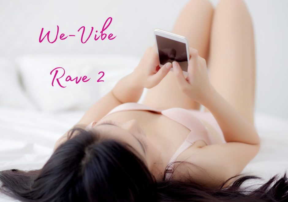 We-Vibe Rave 2 review header image featuring a woman in underwear texting on a mobile phone
