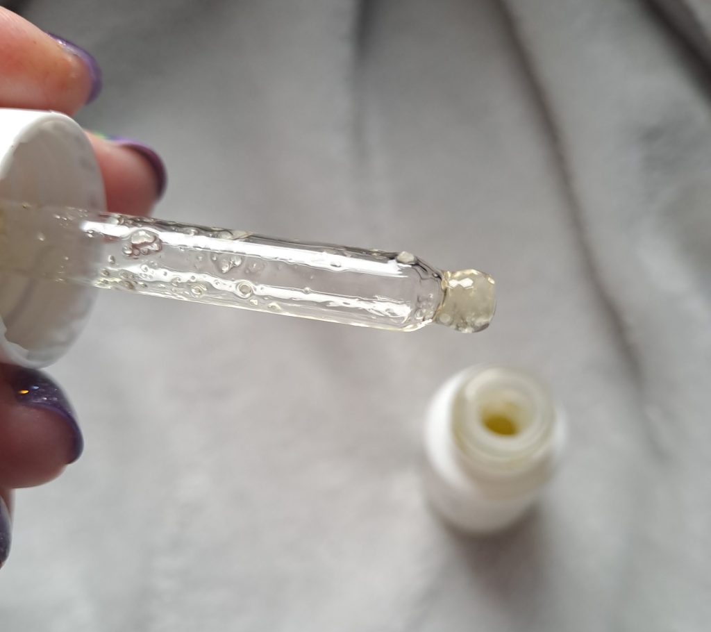 Close up of CBD oil dropper with oral sex oil
