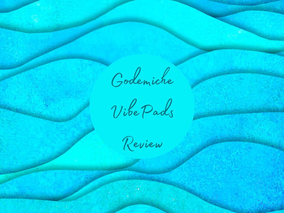 Abstract blue wave background. Text reads: Godemiche Vibe Pad Review