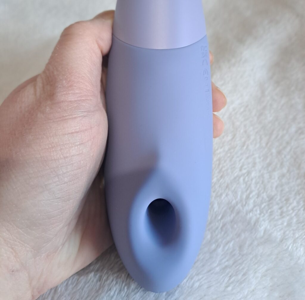 Womanizer Enhance clitoral suction toy in my hand