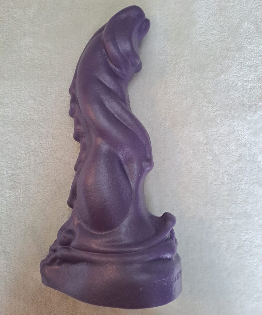 Mr Hankey's Toys Scimitar purple silicone curvy dildo with ridges down the back