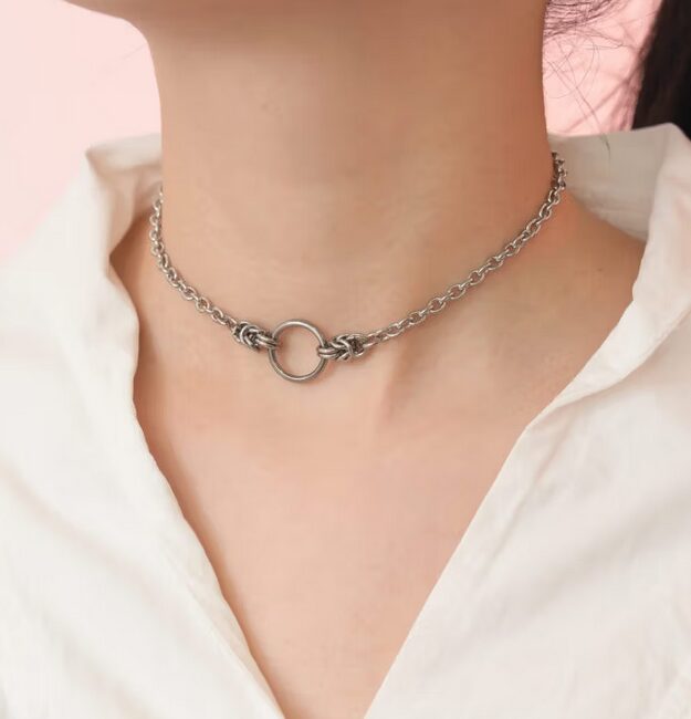 Woman wearing a lockable eternity BDSM collar