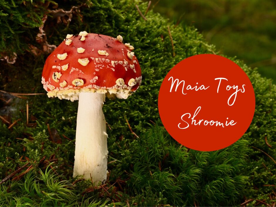 A red mushroom with white spots. Text reads: Maia Toys Shroomie