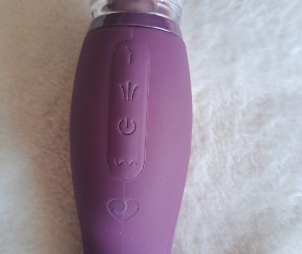 Lovehoney Lick Me pussy pump vibrator, close up view of buttons