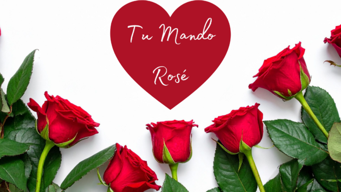 A lower border of red roses. White text in a red heart reads "Tu Mando Rose"