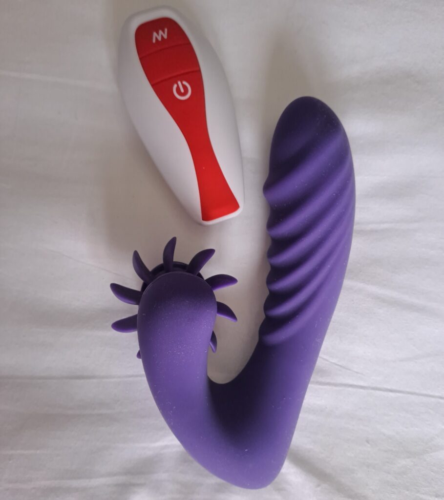 Huxi Flick vibrator pictured with remote control 